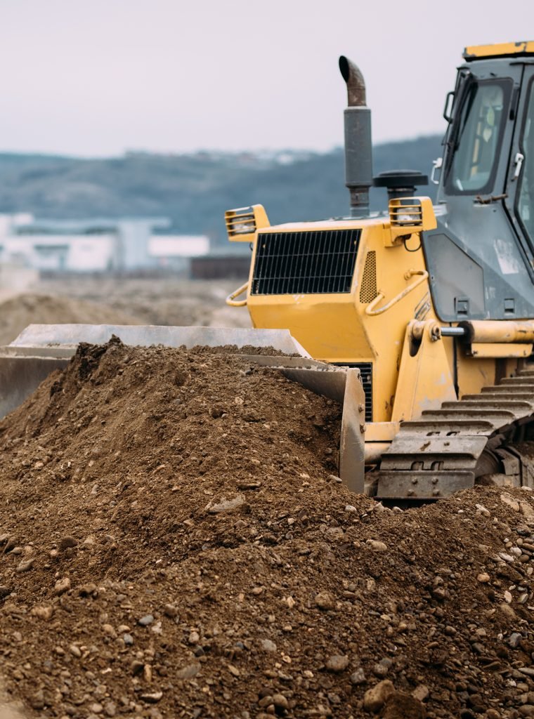 Industrial heavy duty machinery, details of excavator pushing earth and building highway. construction site